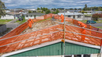 Asbestos roofing. - Here our team is removing an asbestos super 6 roofing system, completely clearing and cleaning the ceiling cavity, for JS Roofing in Wellington
