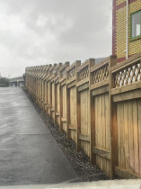 Paling fence with trellis on top