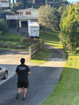 Castor Bay to Glenfield - Team running the driveway with both houses having limited accessibility for a 6T truck to turn