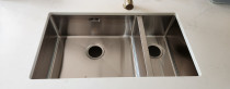 Kitchen Sink Installed - New double-bowl kitchen sink installed and sealed.