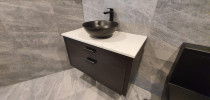 Custom Bathroom Vanity Installed - Custom vanity and basin installed with precision finish.