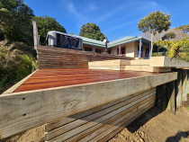 Kwila deck extension - We extended this deck down across an under utilized space to create a new cost nook for the spa, plus a great split level extension to the existing deck