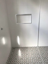 Tiled shower and recess