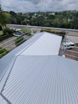 Zincalume , corrugated profile - For this one  we did a Concrete tile roof conversion to long-run, and replaced all the purlins