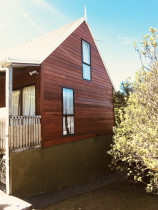 Reclad by Top 2 Bottom Carpentry Ltd - The property the existing Cedar weather boards were completely warped and split due to the UV rays drying them out.
So we removed the existing Cedar and windows, fitted new building wrap, re-dressed the window reveals, and the fitted the pre-stained cedar cladding.
The client was very pleased with the result!