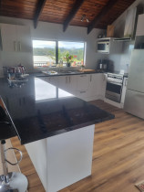 Opua Kitchen Renovation - New cabinetry & benchtops installed.