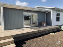 Craig Morris and Marcia Morris - Relocatable House Mangawhai inloved foundations and re gibing in side and a deck