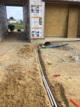 Running power between the two houses by Connect Electrical 2015 Ltd
