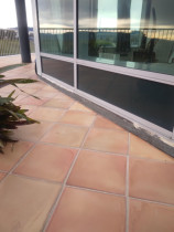 4.  Apartment deck makeover pic 2 - before - After the usual waterblast and washcoat, this deck was laid with fibreglass, then top coated twice to ensure the whole deck is completely waterproofed for years to come! 
Location: Deck Raumati