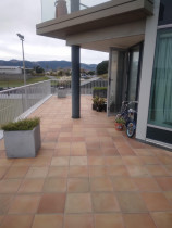 4.  Apartment deck makeover pic 1 - before - After the usual waterblast and washcoat, this deck was laid with fibreglass, then top coated twice to ensure the whole deck is completely waterproofed for years to come! 
Location: Deck Raumati