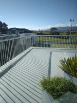4.  Apartment deck makeover pic 4 - After - What a difference! The colour used was again our most popular Galena Grey. What a lovely place to enjoy the sunshine! 
Location - Raumati