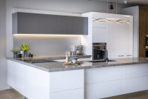 Innovative Kitchens - Mt Roskill Showroom - White modern sleek design with a touch of frost.