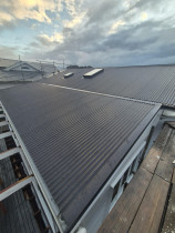 Re-roof  skylight installation - Corrugated iron,  color is slate