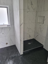 Bathroom - Flow and walls bathroom renovation done with 600×600 porcelain tile
