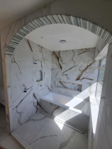 Ensuite bathroom - Ensuite bathroom done with 1200mm×600mm porcelain tile with feature archway