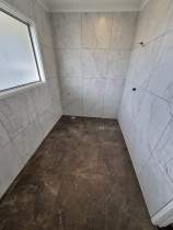 Bathroom Floor and walls - Tiled bathroom with 600×600 porcelain tiles