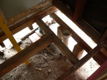 Repiling by Buildstrong - Jacking up subfloor foundation and fitting more piles and fitting earthquake fixings