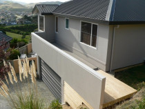 Membrane deck and parapet by Buildstrong - Repair house, new membrane deck and parapet on cavity battern.