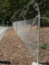 Chain Link fencing by Buildstrong - Over 200m of chain link fencing was installed on Allied Concretes new site, over differing substates and gradiants